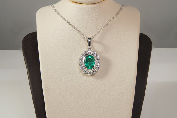 Emerald and Diamond Halo Pendant