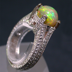 Side view of White Gold Ring set with an Ethiopian Opal and Diamonds 