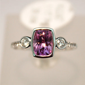 White Gold Ring Set with a Beautiful Pink Sapphire and Diamonds
