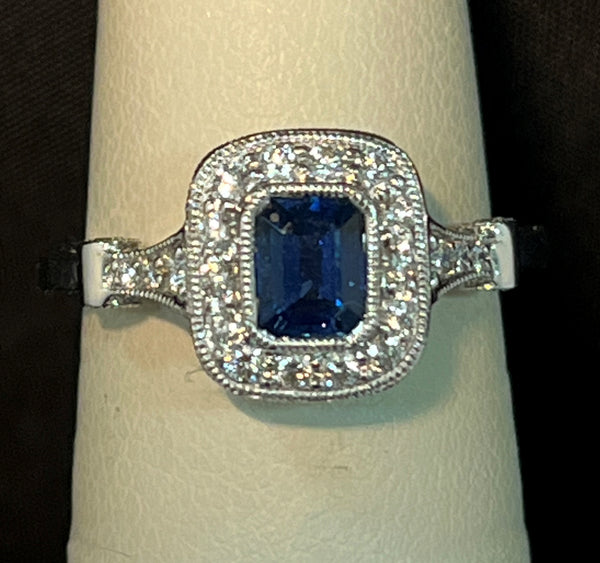 18 Karat Gold Emerald cut Sapphire and Diamonnd Ring