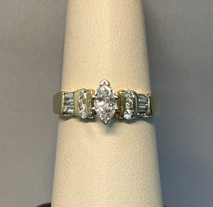 Marquis Diamond Ring with Round and Emerald Cut Diamond Band