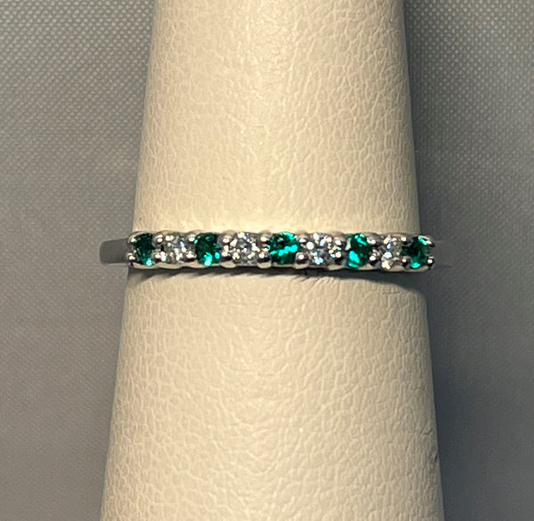 Shared Prong Emerald and Diamond Ring