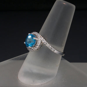Bypass Style Blue Topaz and Diamond Ring